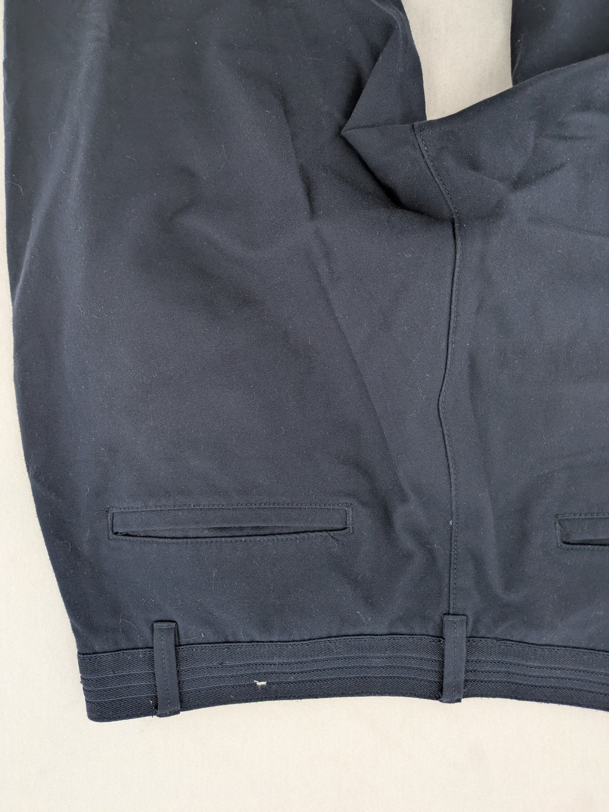Zara navy chinos flat front design with stretch fabric for comfort and versatility.