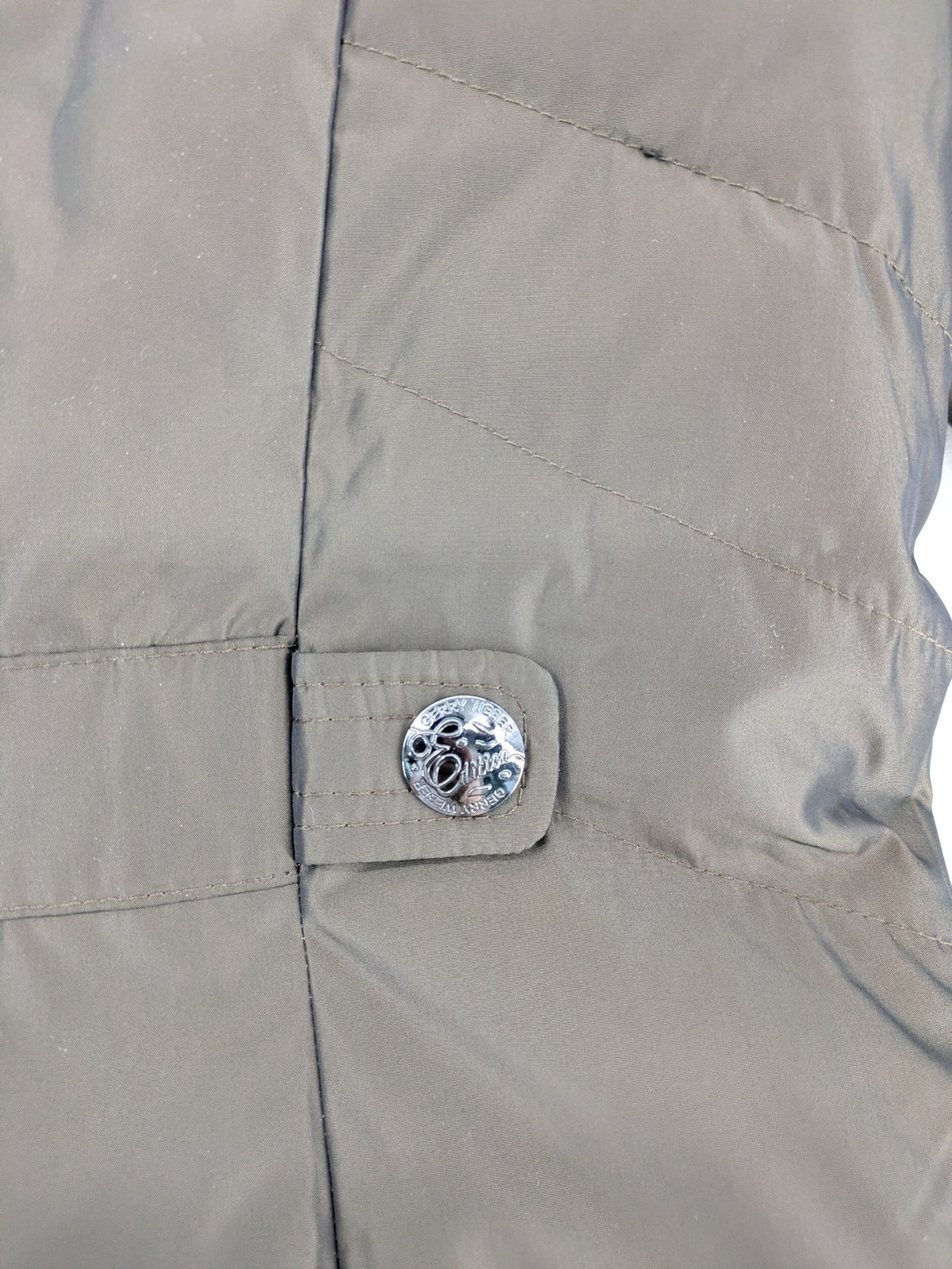 Gerry Weber Edition grey quilted coat with faux fur collar and metal toggle closures.
