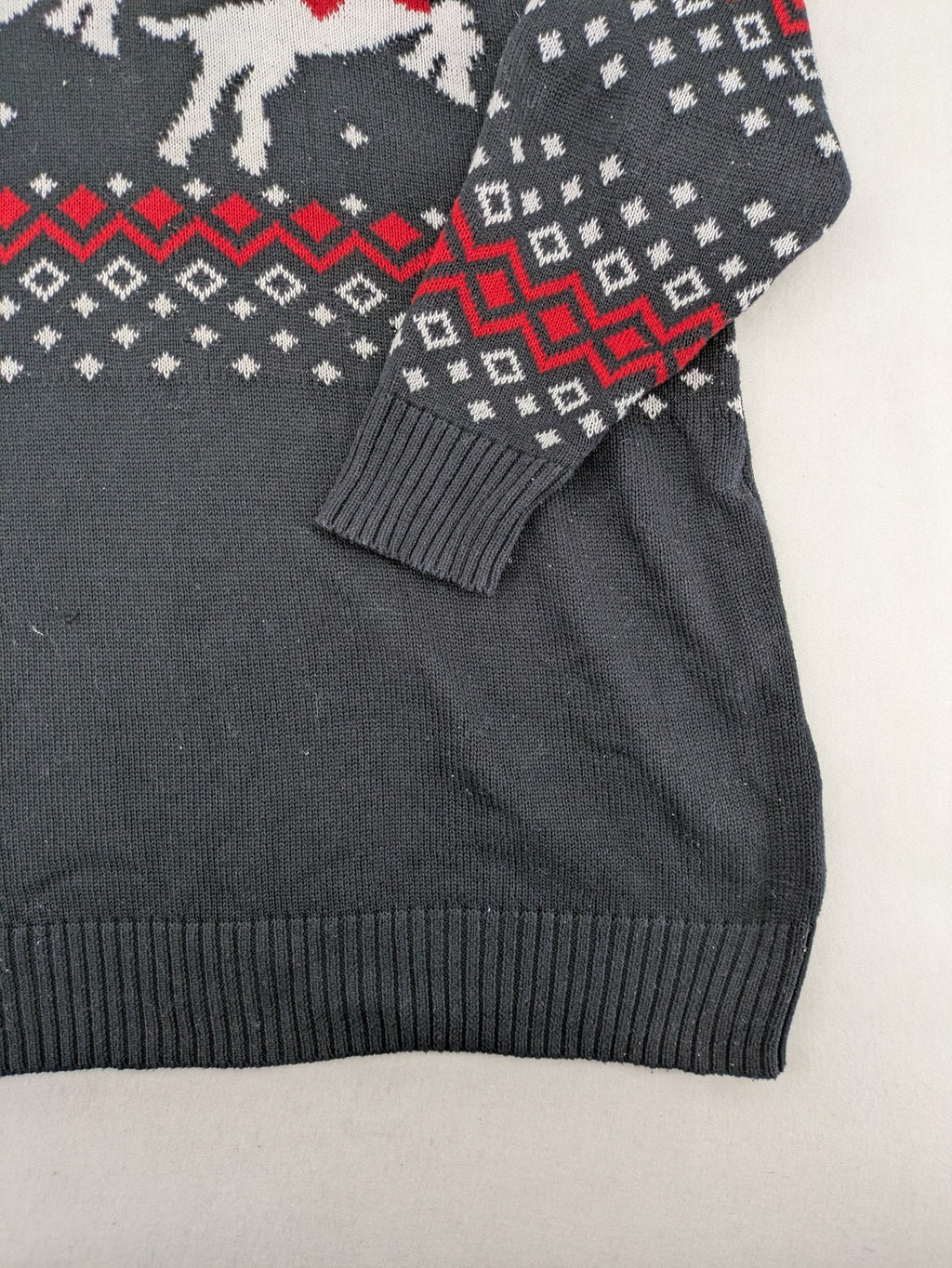 BPC Bonprix grey red white turtle neck jumper with reindeer Fair-Isle pattern and decorative buttons.
