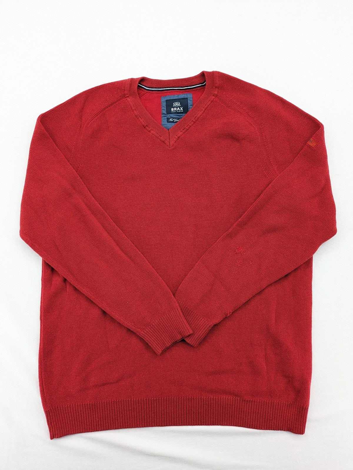 BRAX red turtle neck jumper V-neck design made from merino wool and cotton blend.