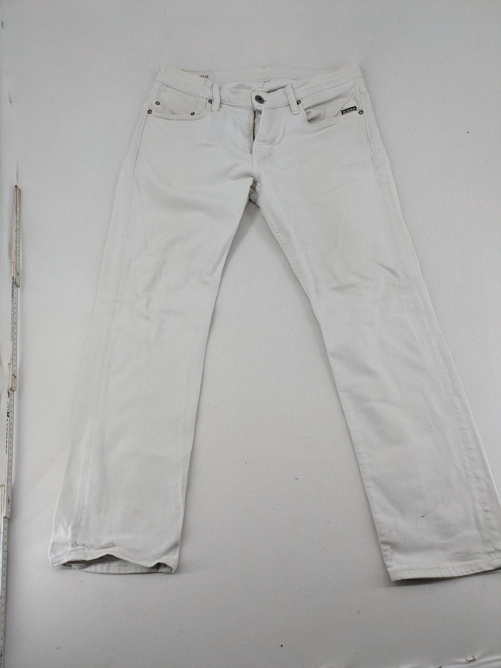 G-Star Raw white straight jeans with logo patch and stretch denim material.