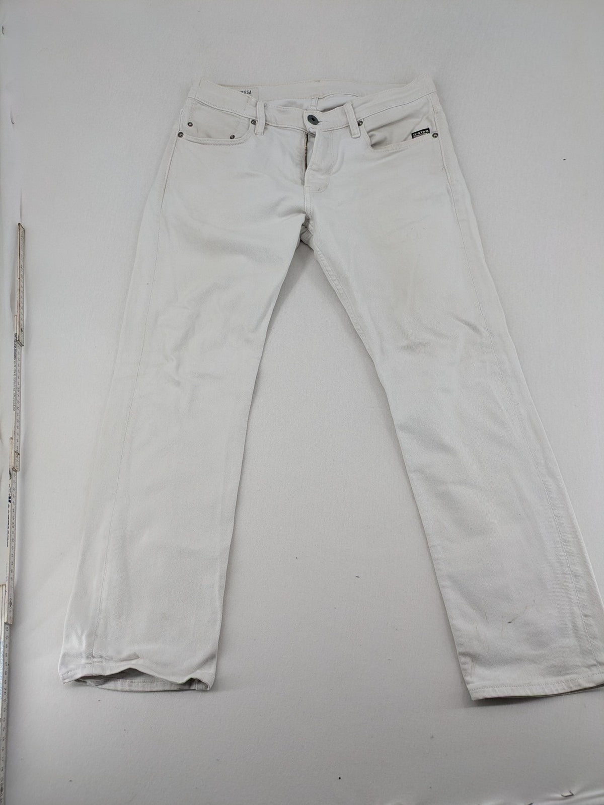 G-Star Raw white straight jeans with logo patch and stretch denim material.