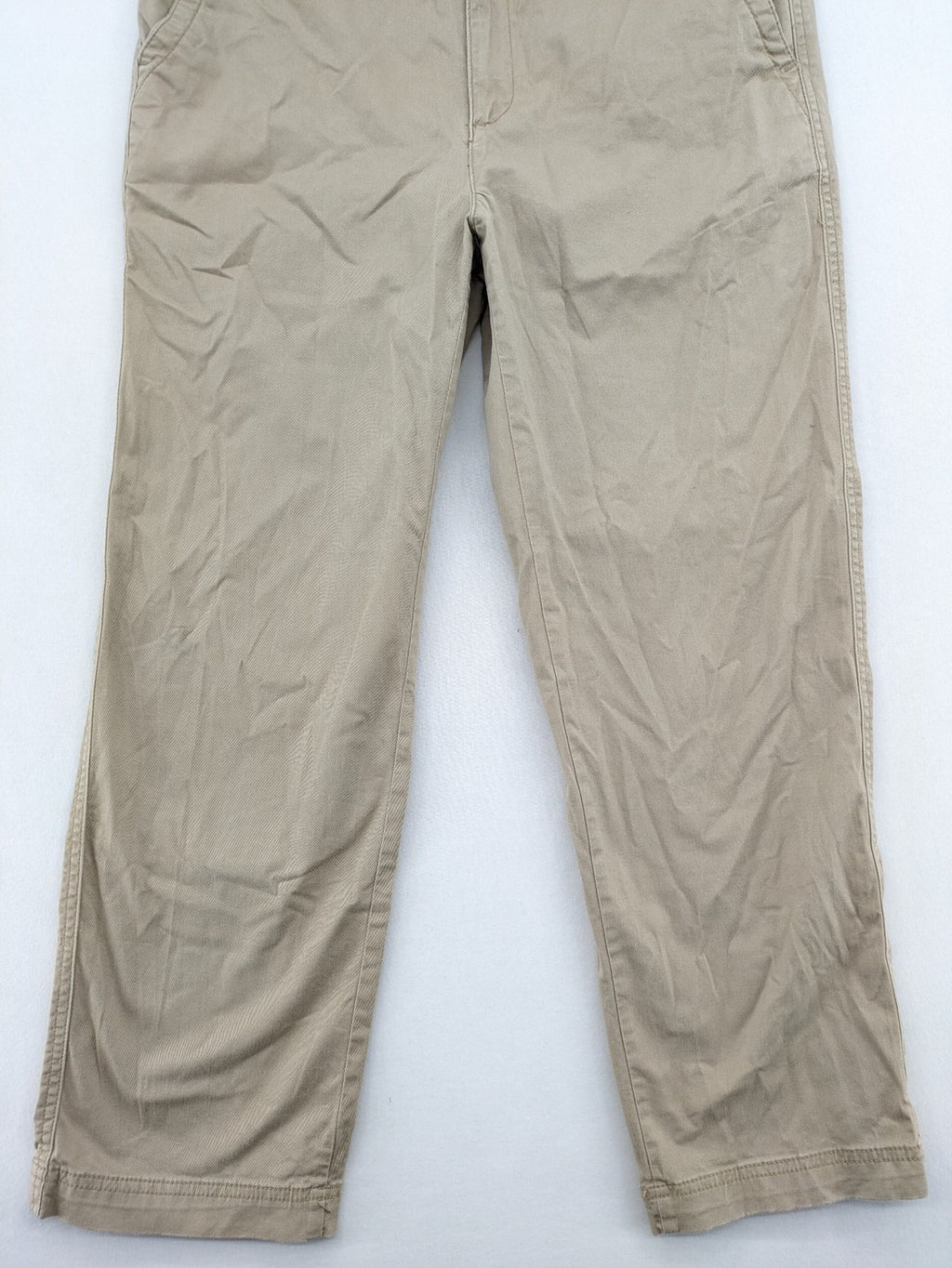 Gap beige girlfriend chino pants with relaxed fit and soft cotton-stretch blend.