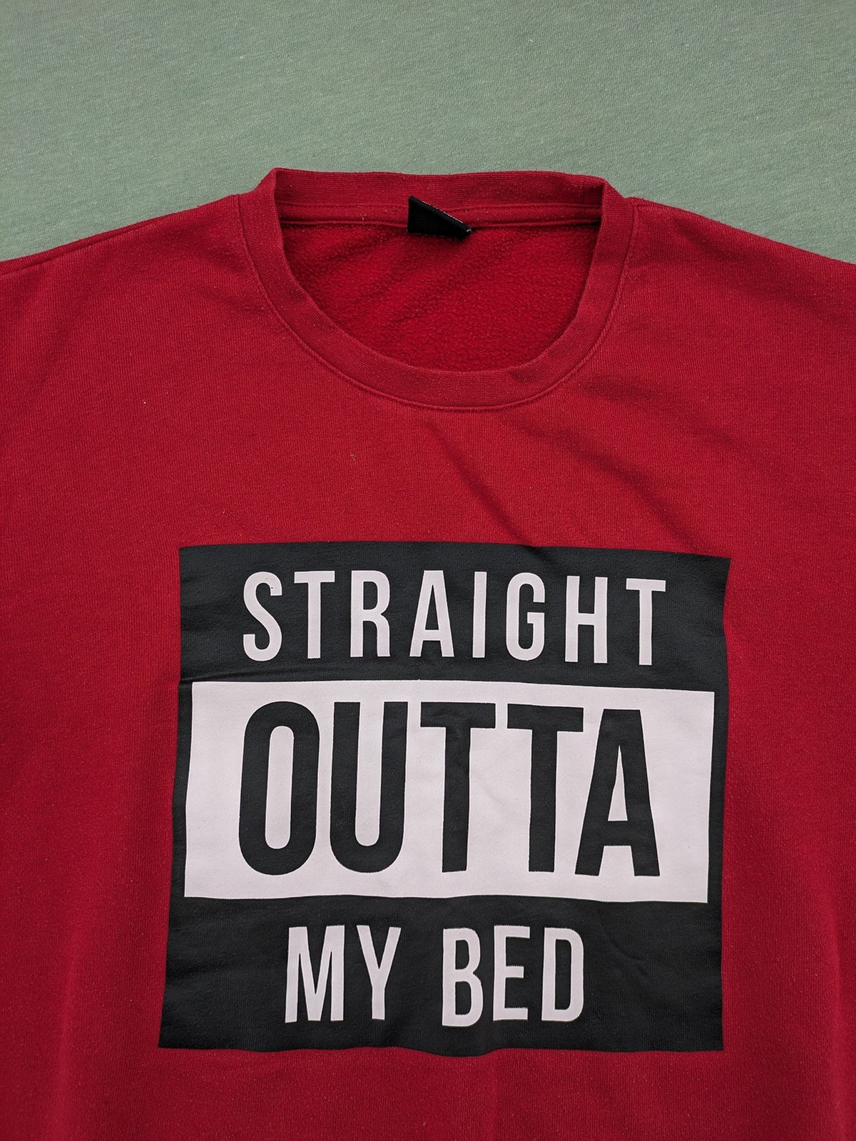 FSBN red turtle neck jumper with "Straight Outta My Bed" graphic print and slim fit.