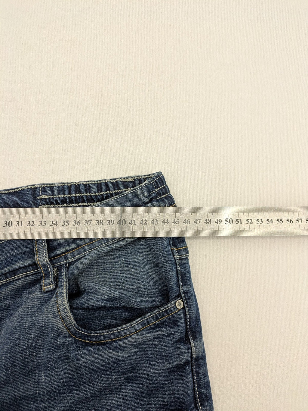 Up Fashion blue denim capri shorts, 5-pocket style, elastic waistband, soft cotton blend.