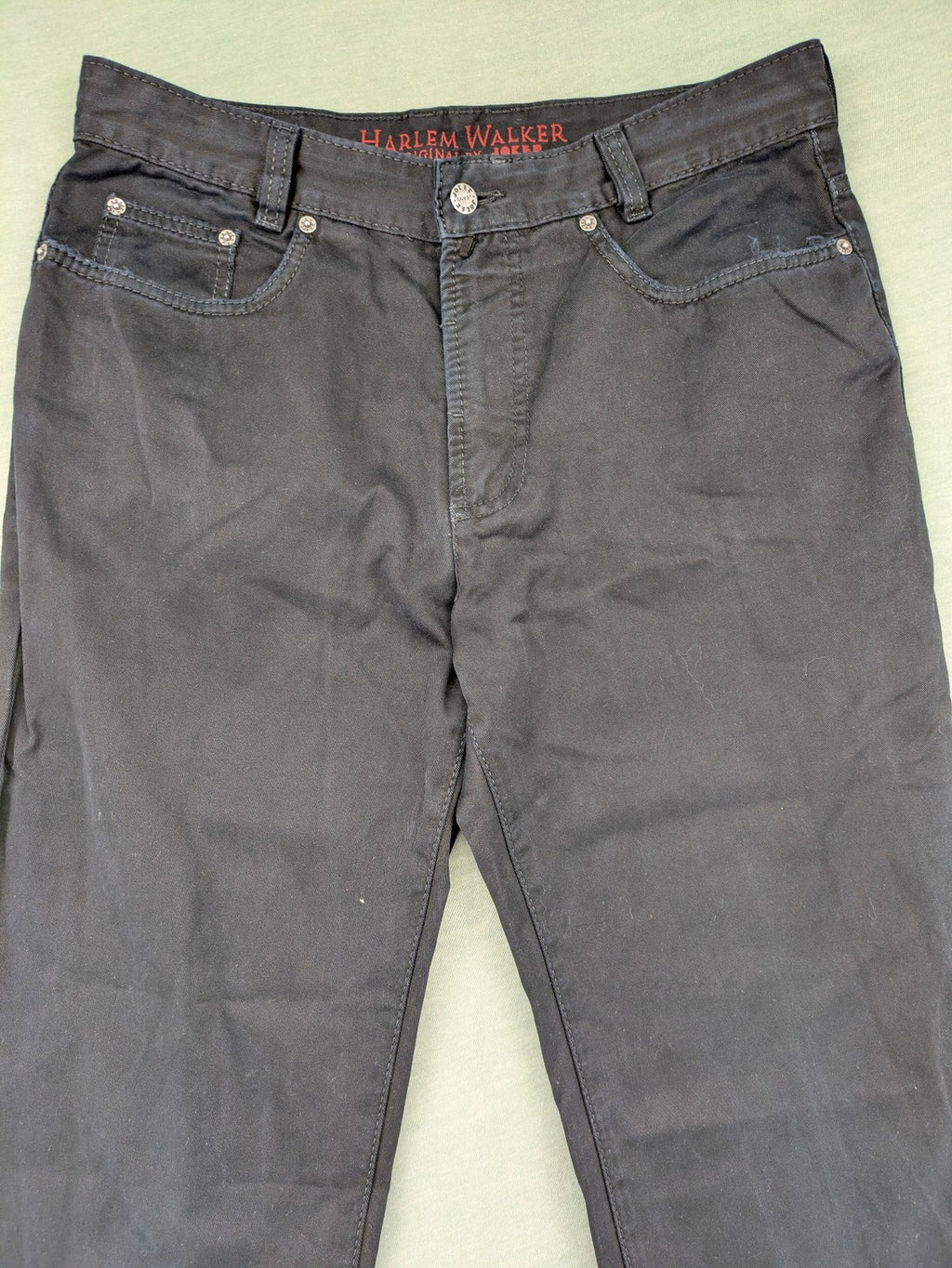 Joker black straight jeans five-pocket design with prominent stitching and brand details.