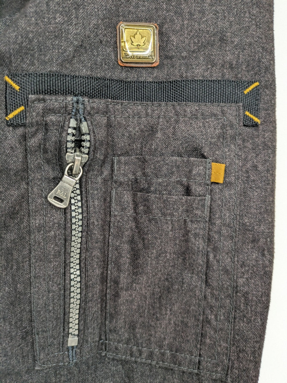 Rover & Lakes grey jacket with hood, quilted lining, and multiple pockets.