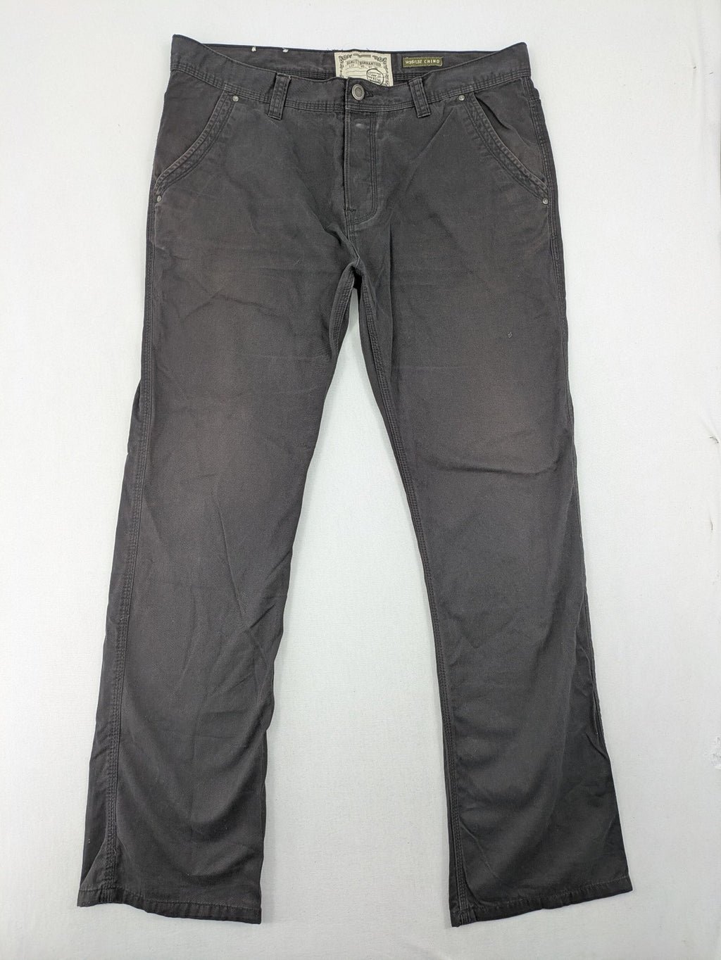 Denim & Co. grey chino pants cotton workwear with button fly and pocket rivets.