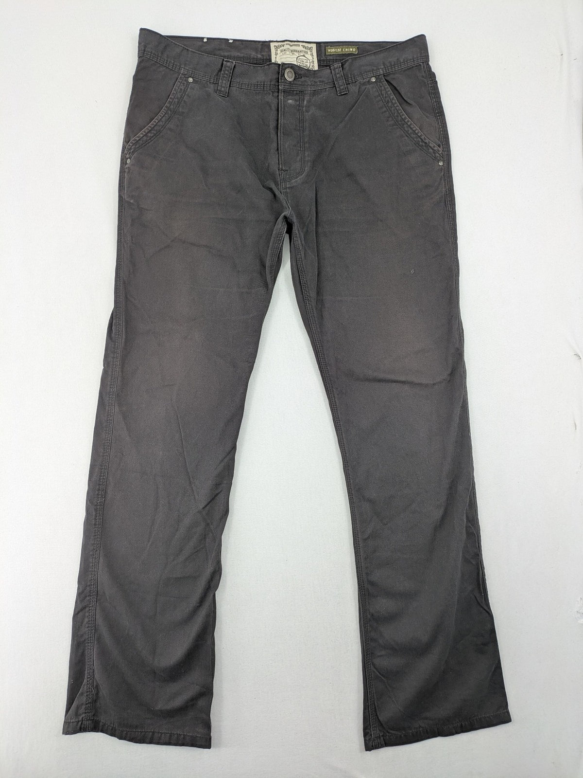 Denim & Co. grey chino pants cotton workwear with button fly and pocket rivets.
