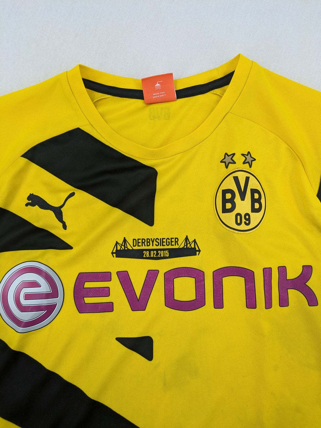 Puma black and purple soccer uniform with yellow accents, Reus #11, "Derbysieger 2015" print.