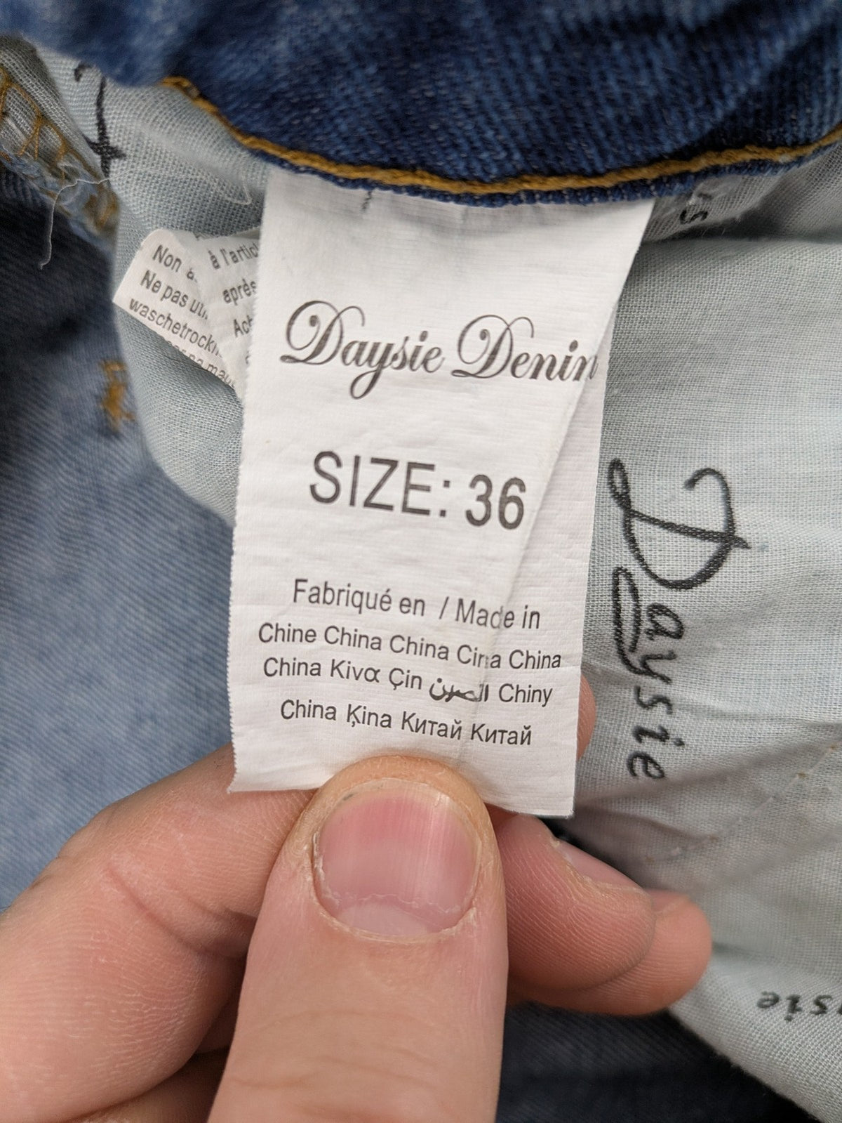 Daysie blue boyfriend jeans shorts with distressed rips and classic 5-pocket design.
