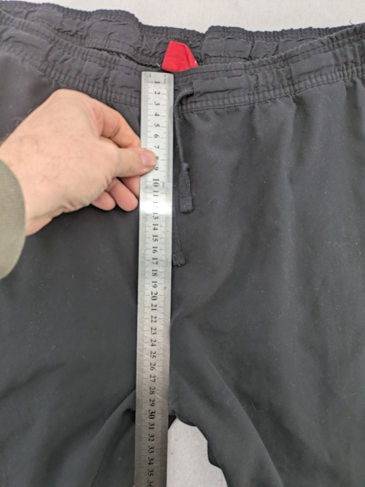 Slazenger grey loungewear joggers with adjustable drawstring and subtle logo on thigh.