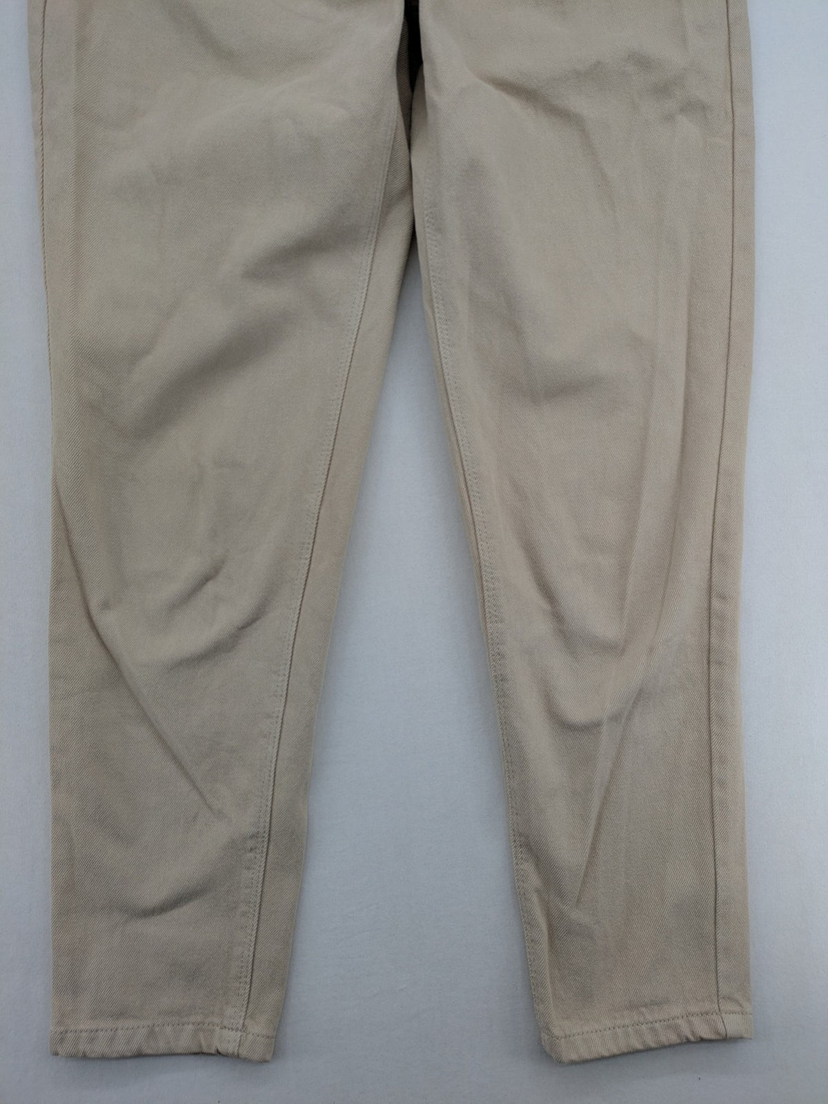 Pimkie beige mom jeans high waist tapered fit with front button placket and cotton material.