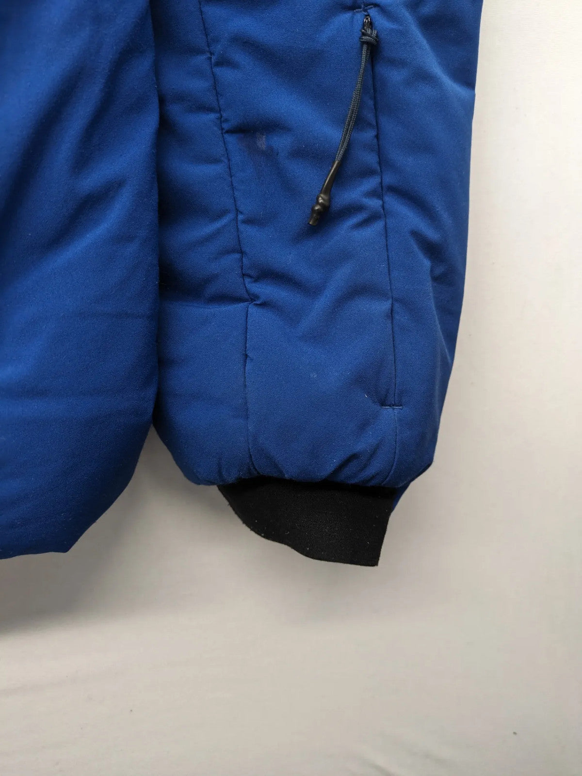 C&A blue winter jacket with hood, zip closure, and multiple pockets, used condition.