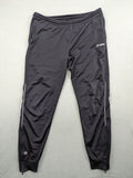 Jako black training pants size L with zippered pockets and elastic waistband.
