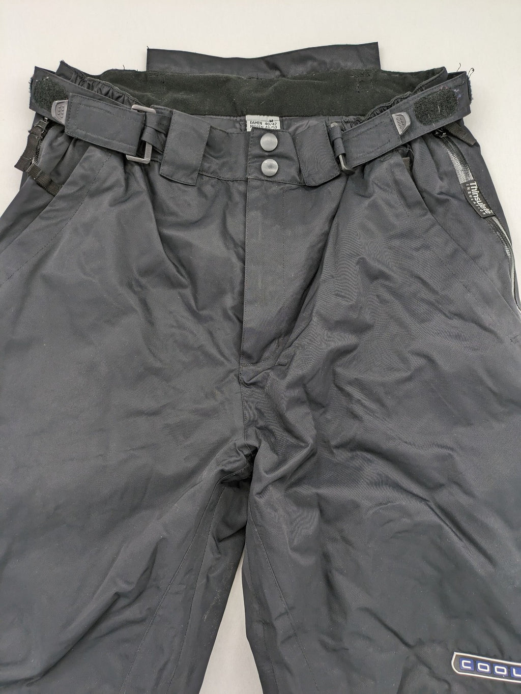 COOLE black ski pants with Thinsulate insulation and versatile unisex design.