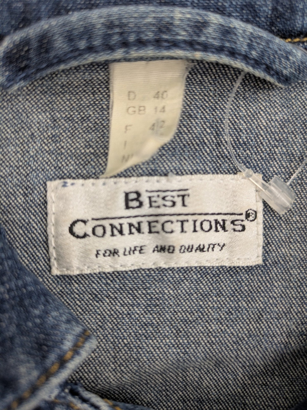 Best Connections cream denim jacket classic design with button placket and two chest pockets.
