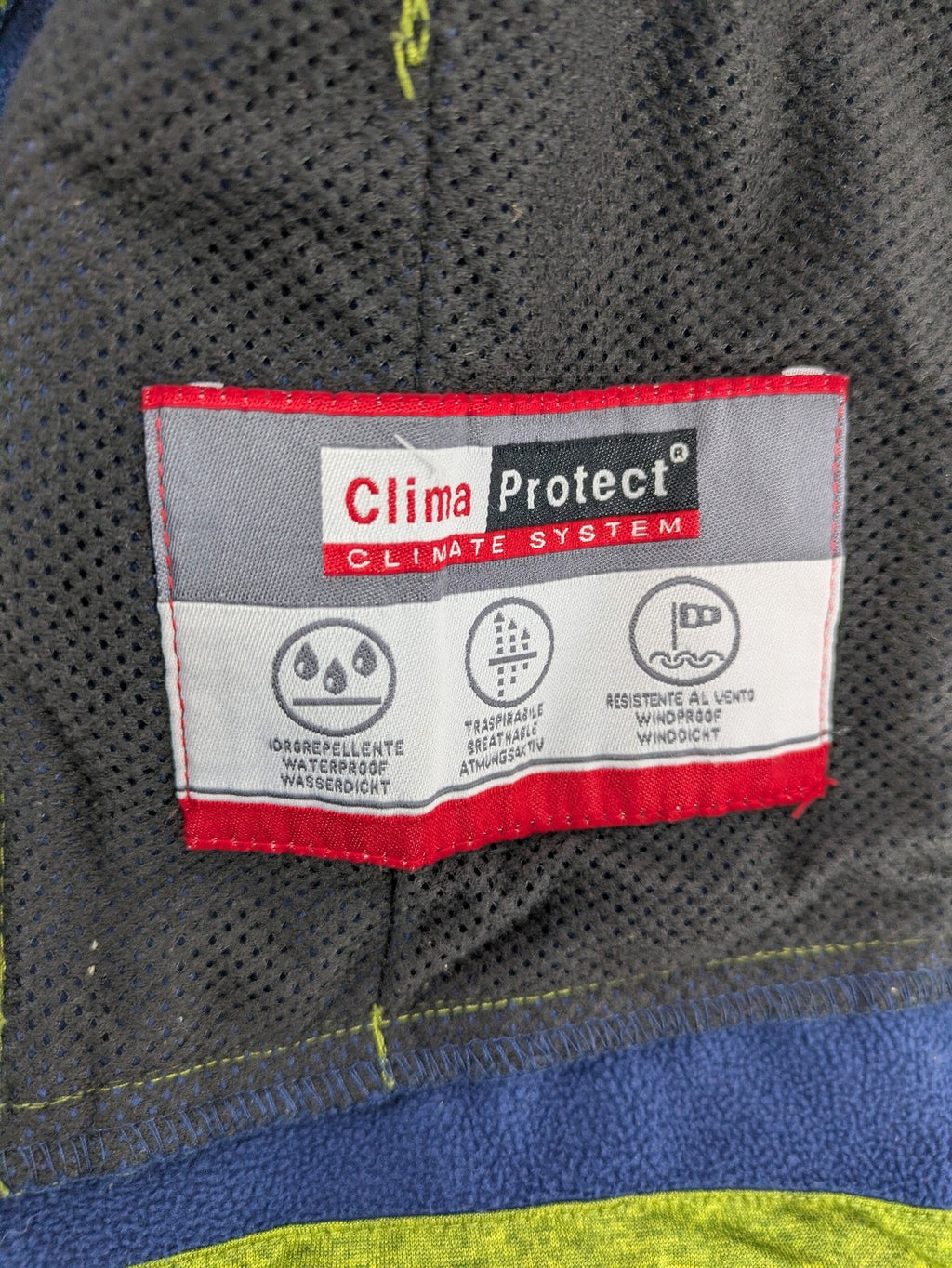 CMP outdoor coat blue and green with fleece lining, zip closure, and hood.