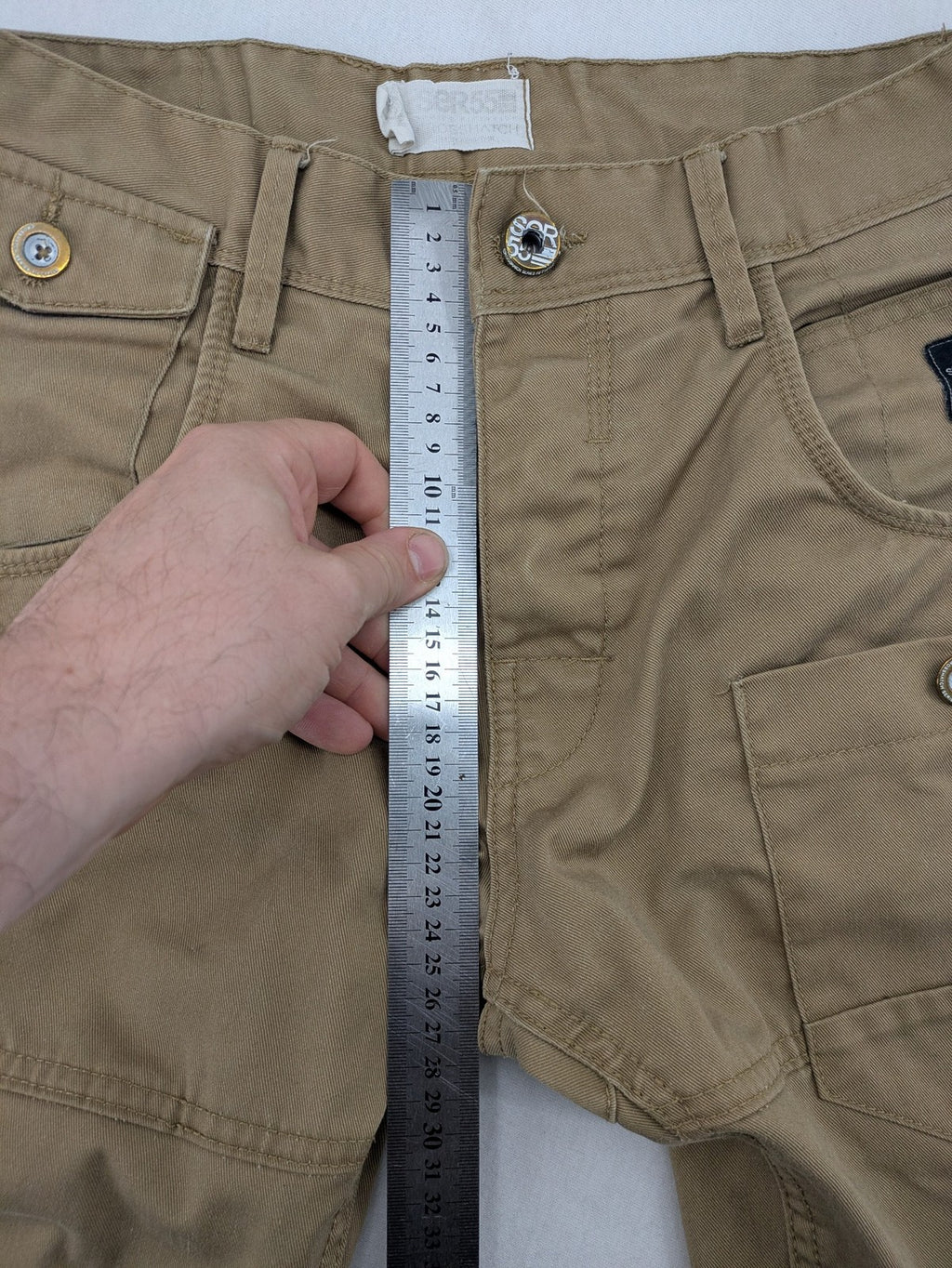 Crosshatch grey cargo pants with multiple pockets and durable cotton-polyester blend.