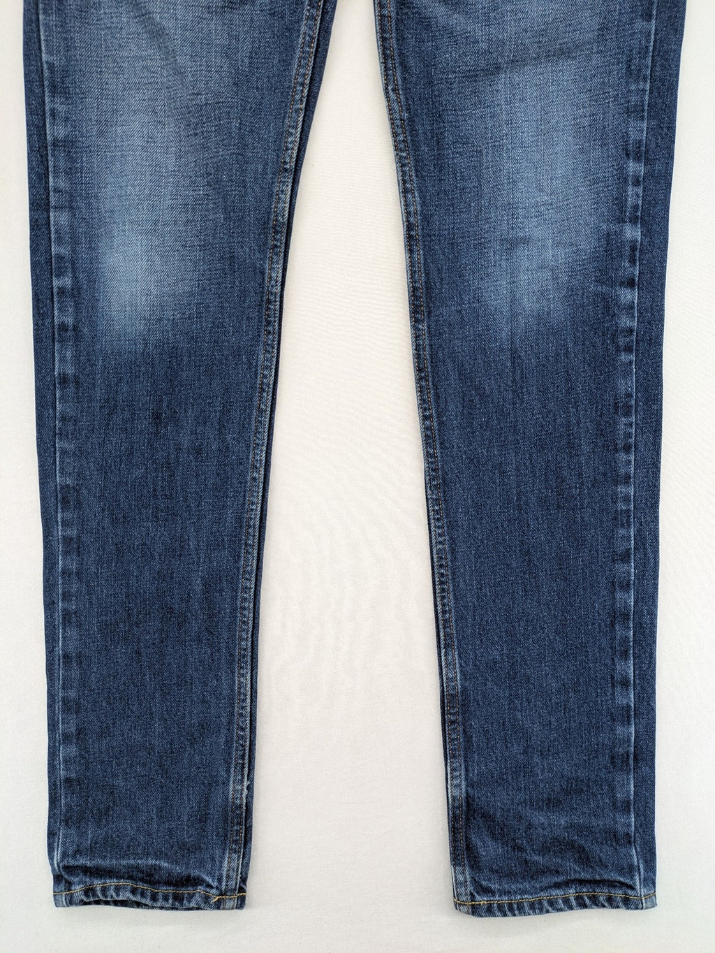 Hollister blue super skinny jeans medium wash button fly with faded details.