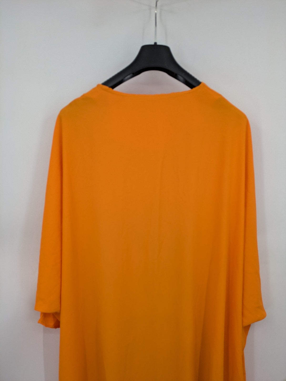 Kaftan orange oversized summer dress with unique graphic print and long sleeves.