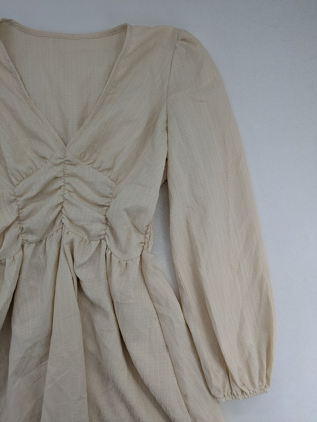 SHEIN beige bridal party dress with V-neck, ruffled bodice, and bishop sleeves.