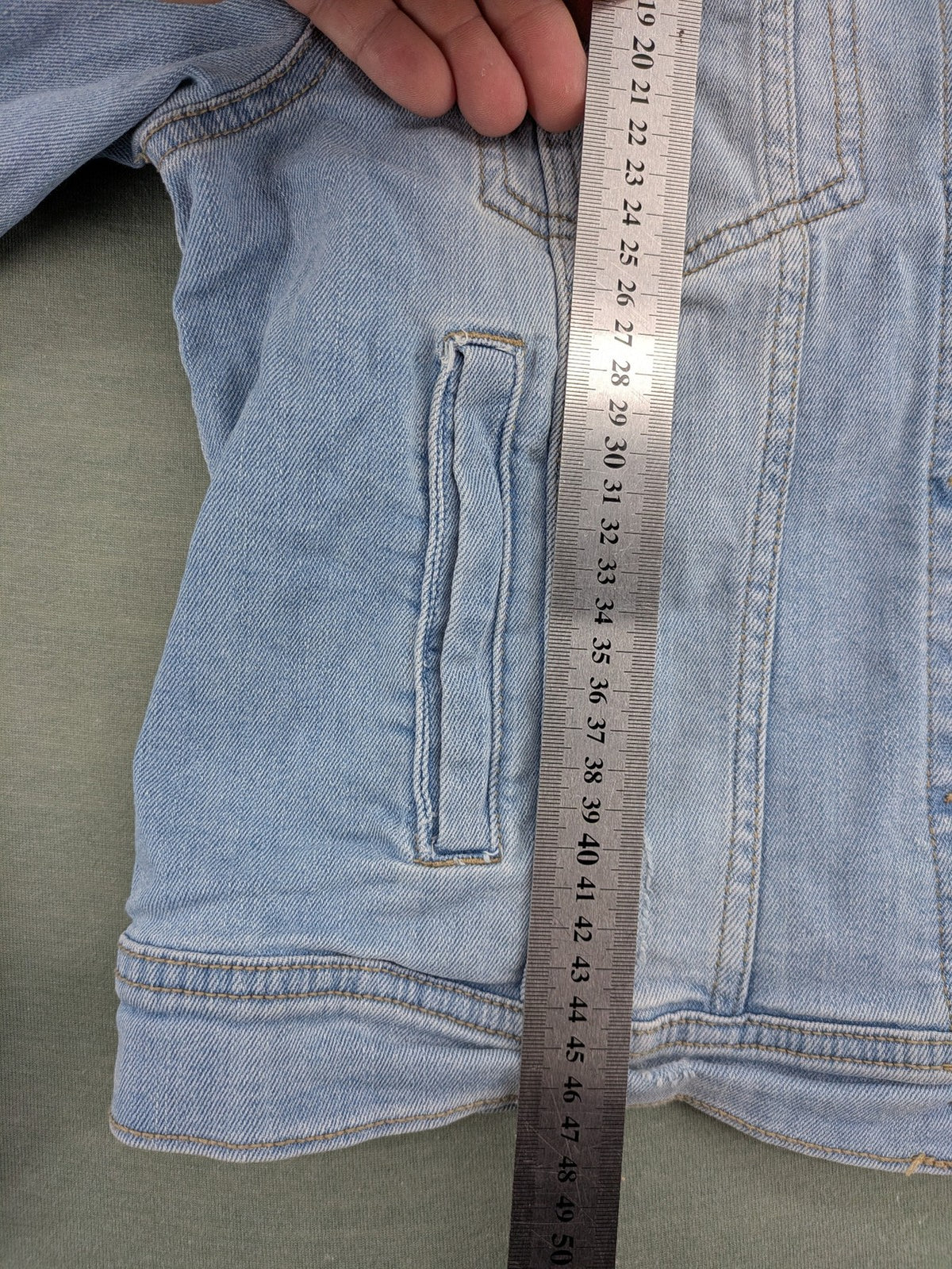 Pimkie blue denim jacket with classic cut, button placket, and two chest pockets.