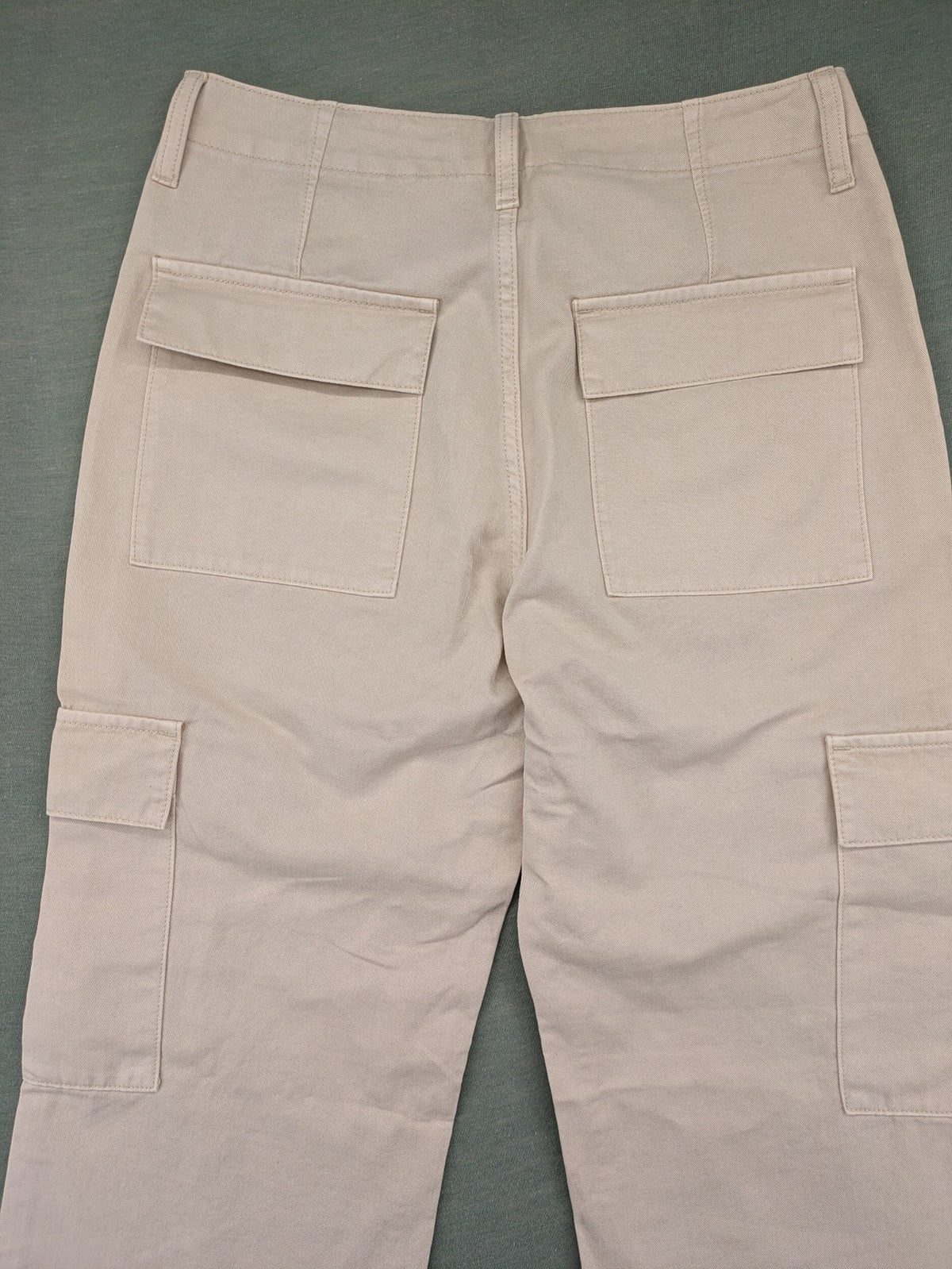 MNG beige cargo pants with straight leg, button closure, and patch pockets.