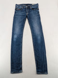 Diesel blue slim skinny jeans with logo patch and stretch denim material.