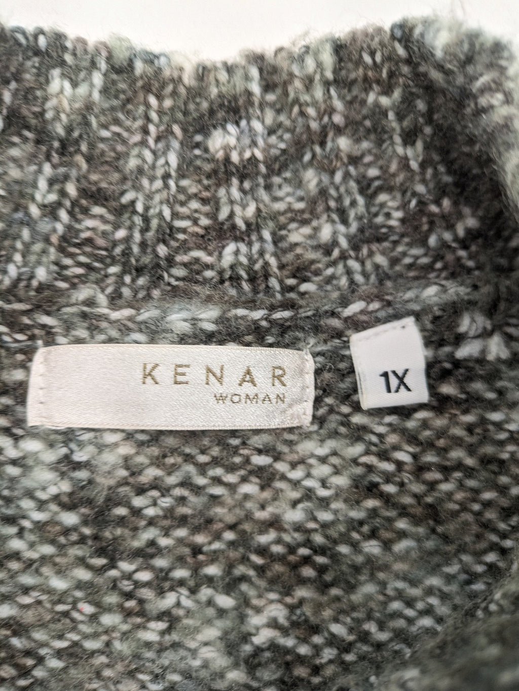 Kenar turtle neck jumper black grey white melange wool blend open knit design