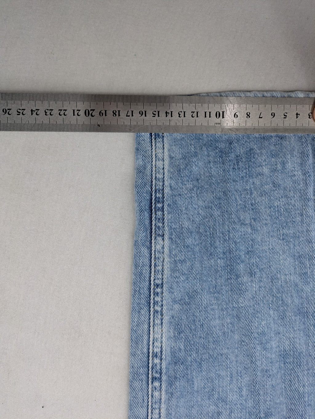 Oskar blue slim fit jeans with classic 5-pocket design and light wash.