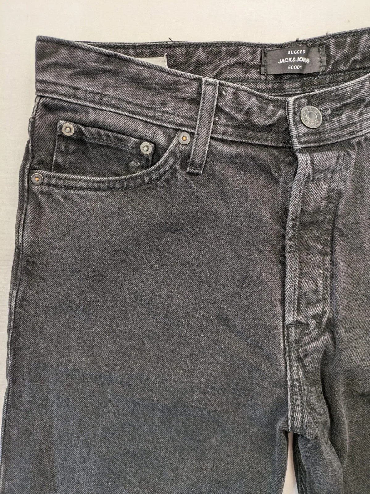 Jack & Jones grey loose fit jeans with classic button fly and 5-pocket design.
