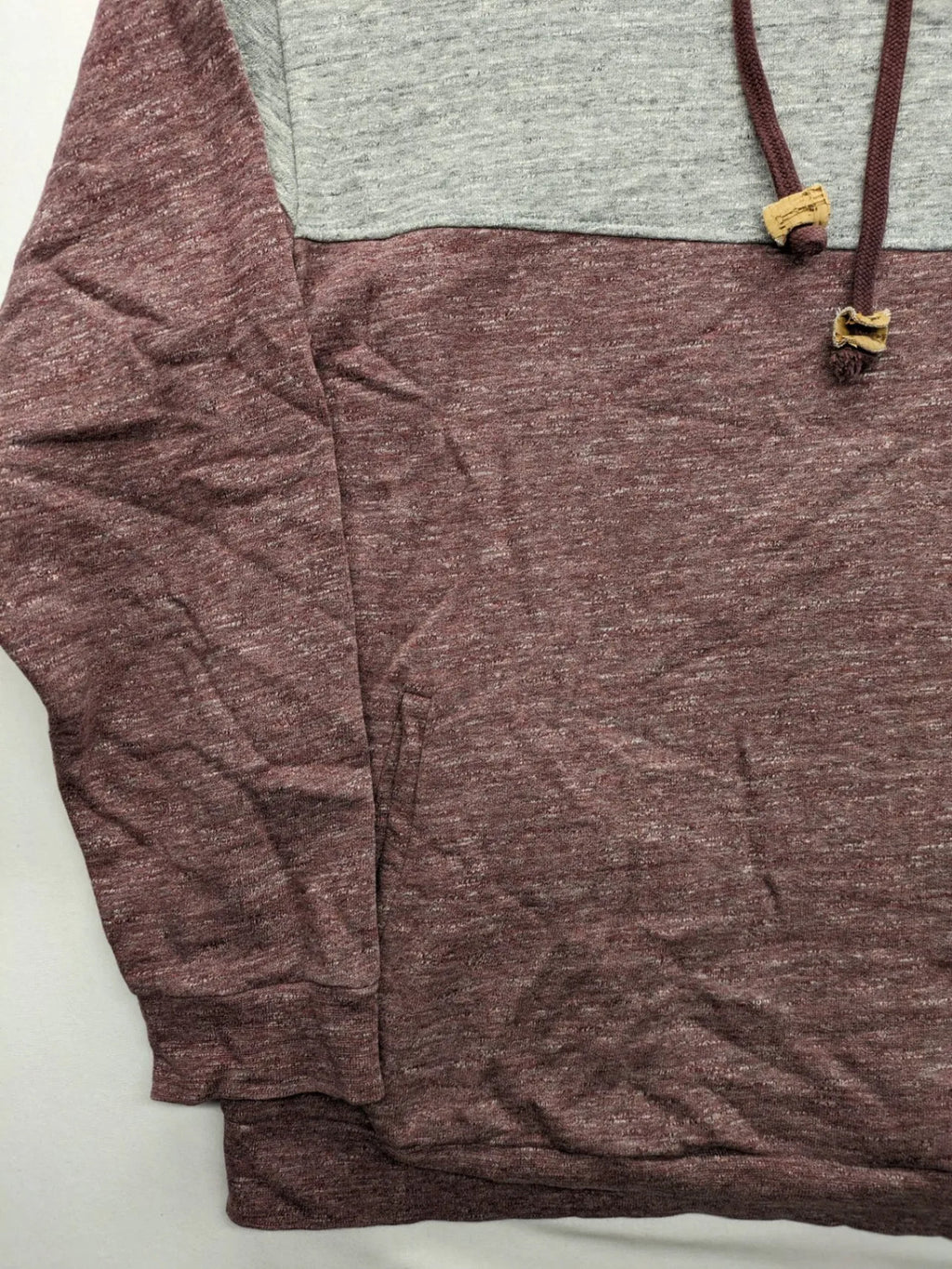 Bleed turtle neck jumper grey burgundy colorblock design with adjustable hood and kangaroo pocket.