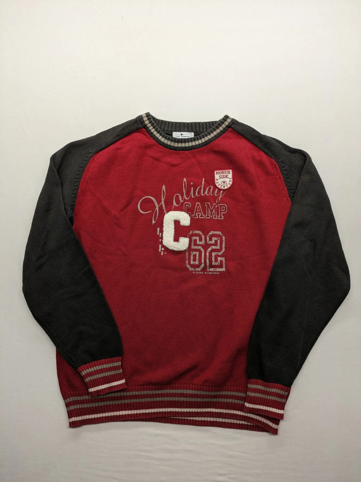 Tom Tailor black and red turtle neck jumper with "Holiday Camp" chenille patch and striped cuffs.