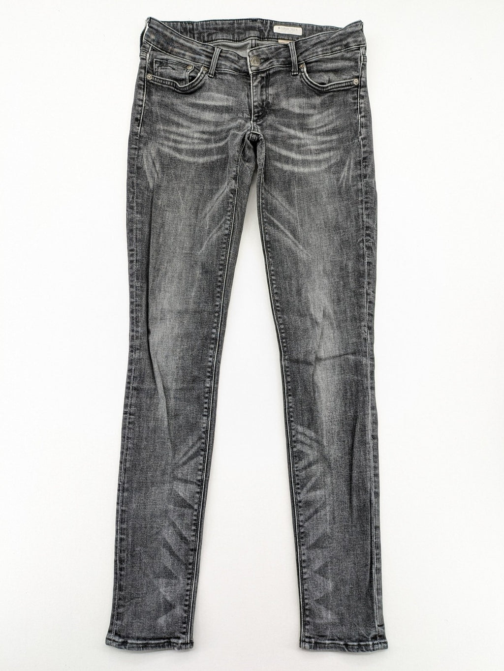 H&M grey skinny jeans with low rise, classic 5-pocket style, and washed denim finish.