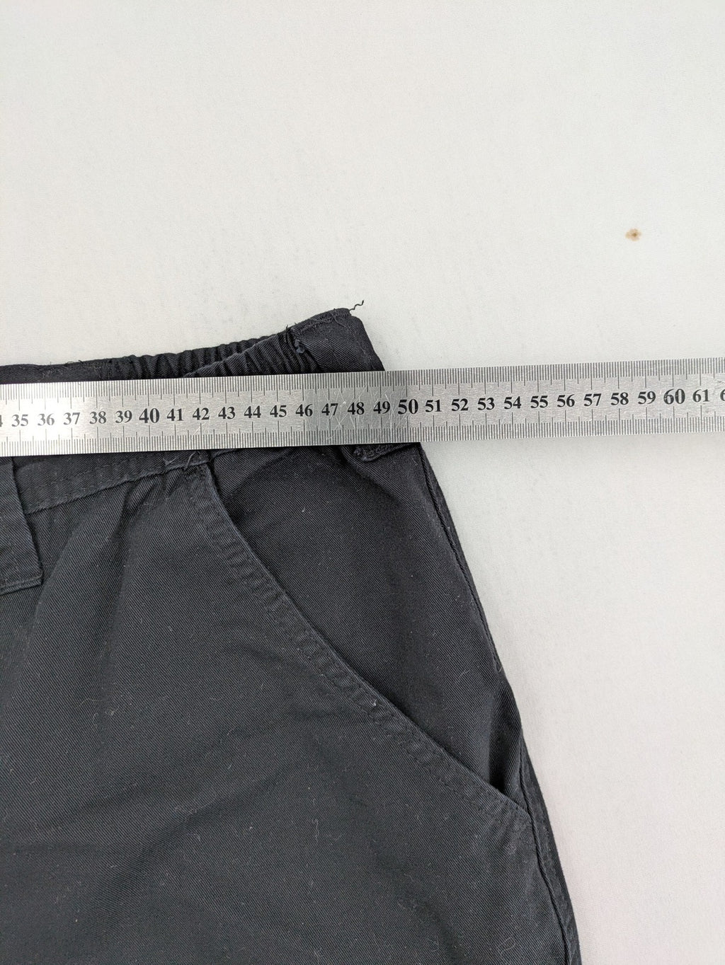 Travel Master black hunting and tactical pants, zip-off design, 100% cotton, multiple pockets.