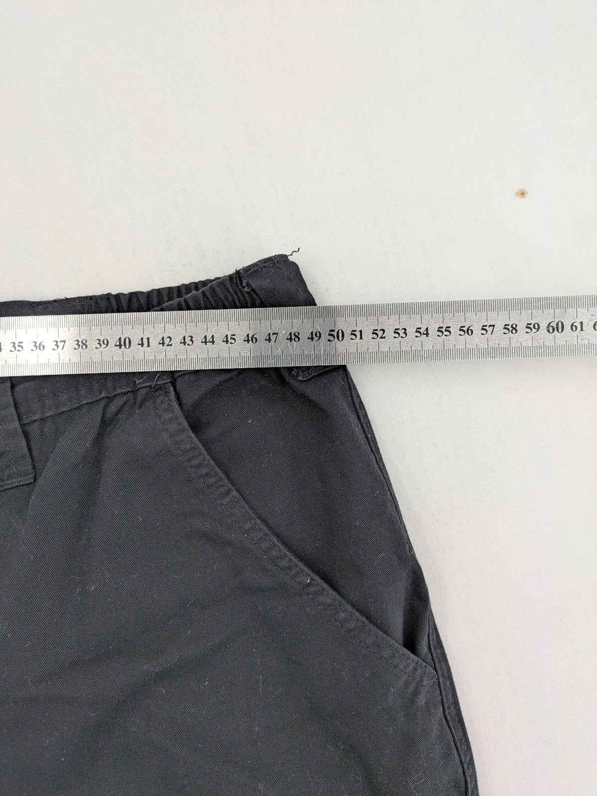 Travel Master black hunting and tactical pants, zip-off design, 100% cotton, multiple pockets.