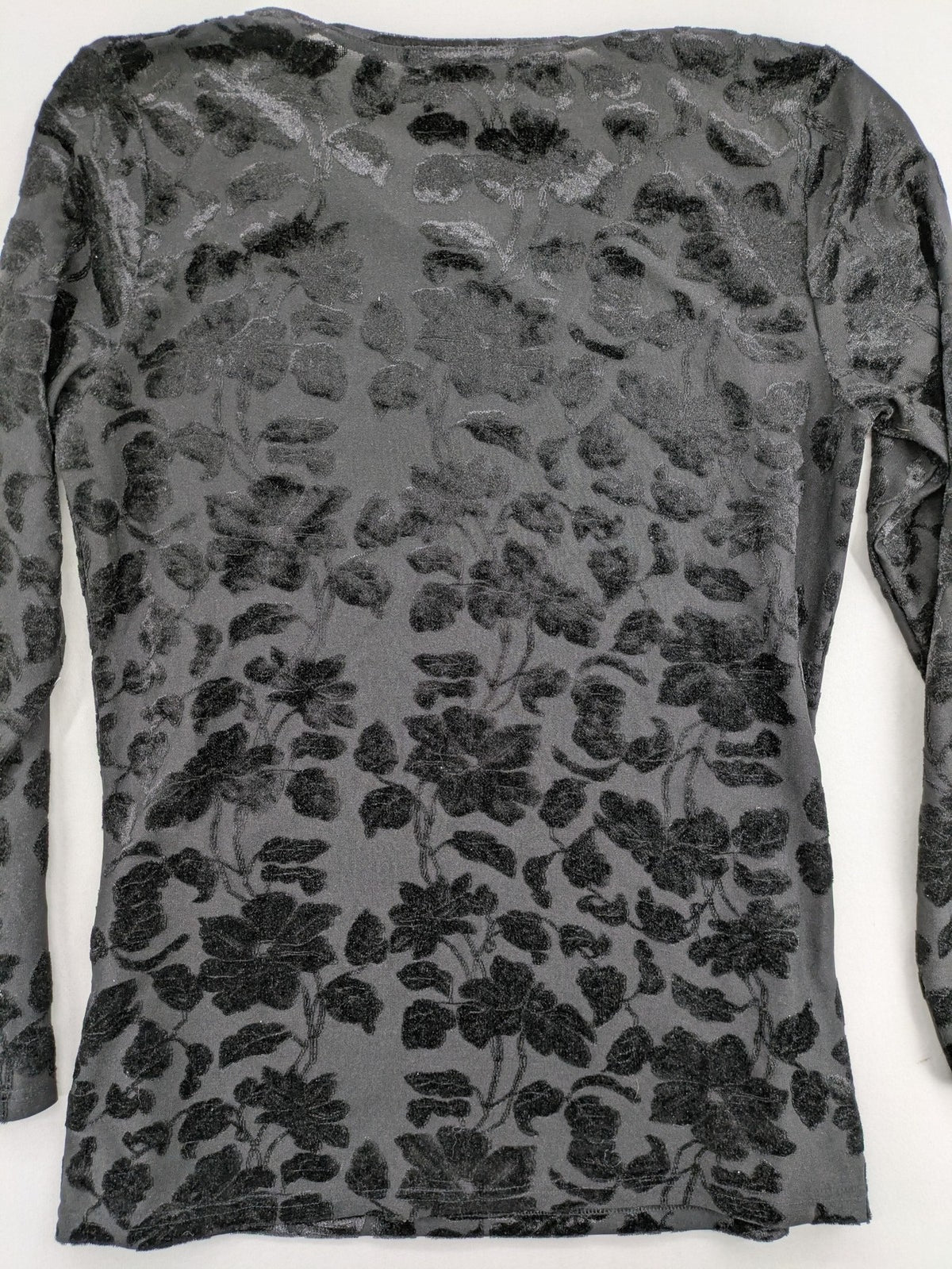 TCM black long sleeve top with floral flock print on sheer fabric.