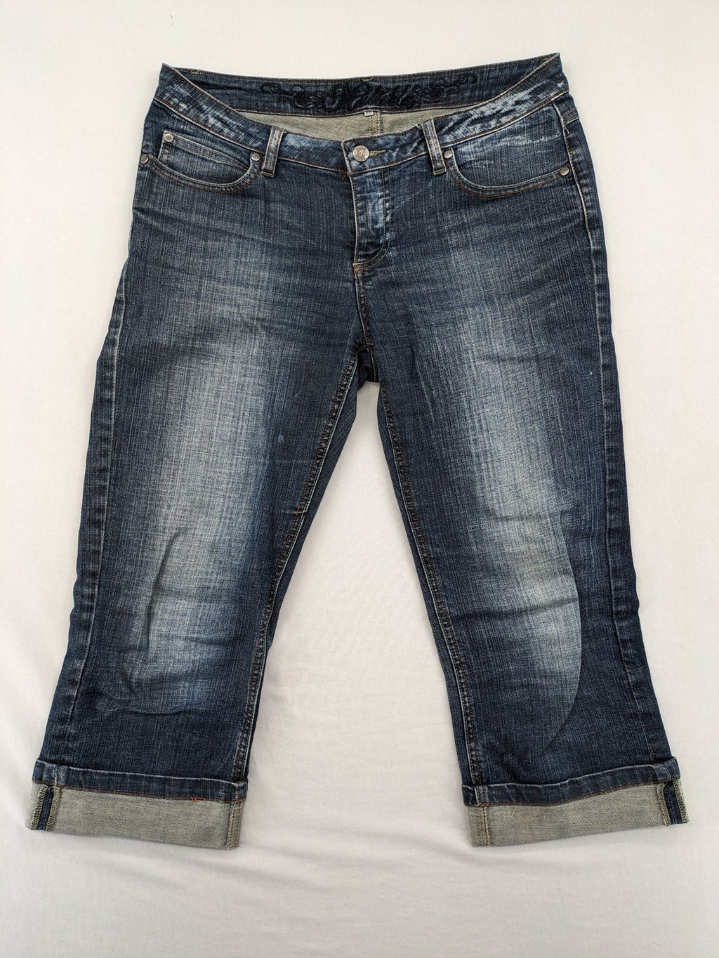 BLU blue straight jeans with washed effect, rolled hem, and five-pocket design.