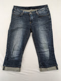 BLU blue straight jeans with washed effect, rolled hem, and five-pocket design.