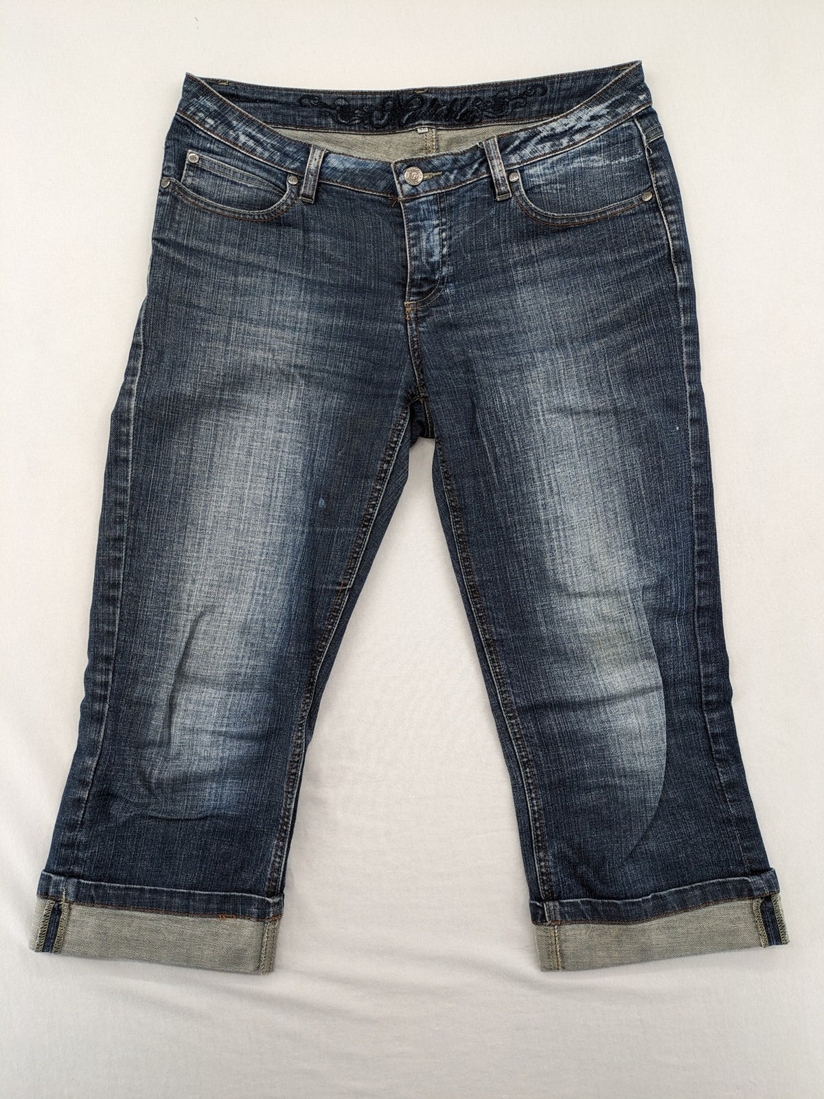 BLU blue straight jeans with washed effect, rolled hem, and five-pocket design.