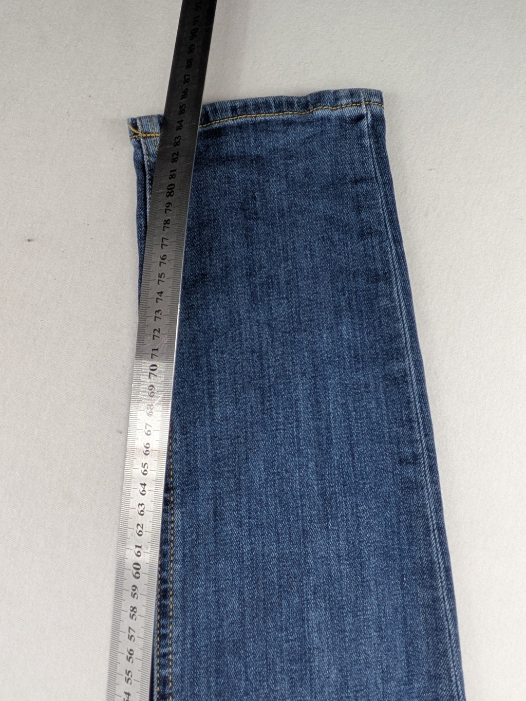 Diesel blue slim skinny jeans with logo patch and stretch denim material.