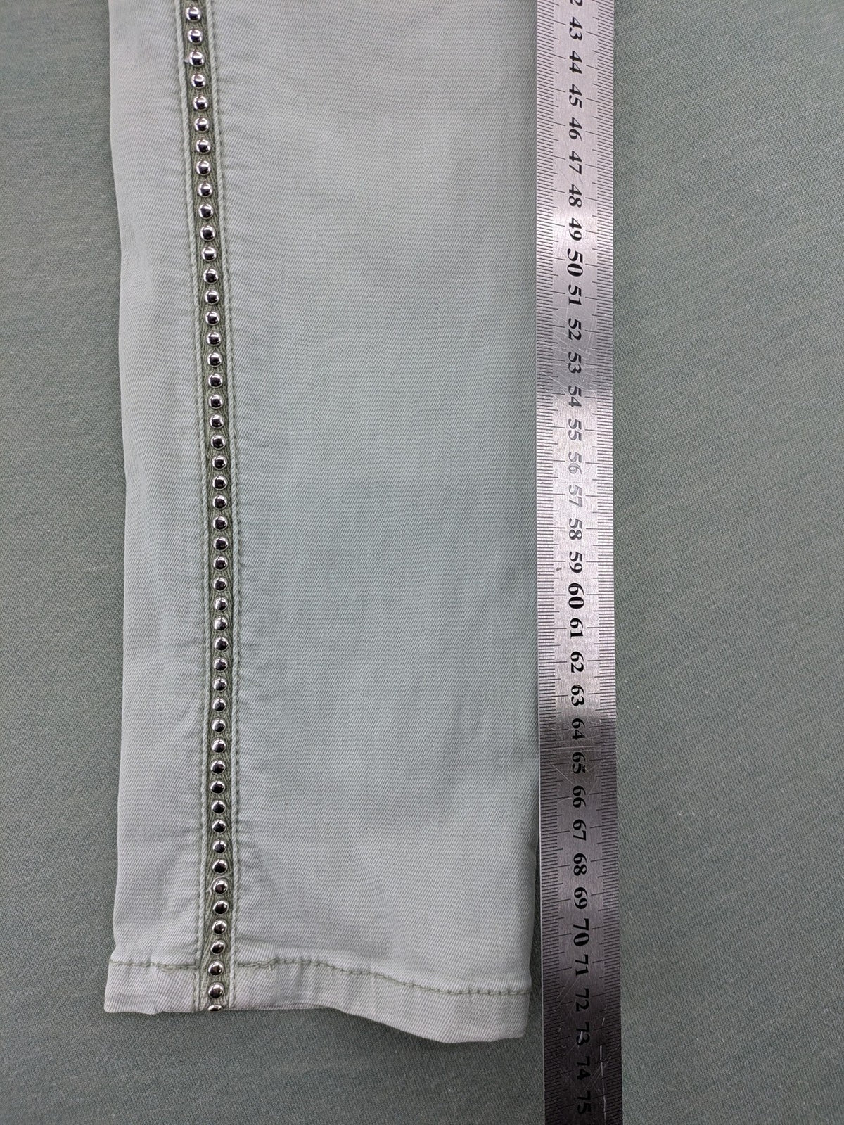 Jewelly grey straight jeans slim fit with silver decorative studs along side seams.