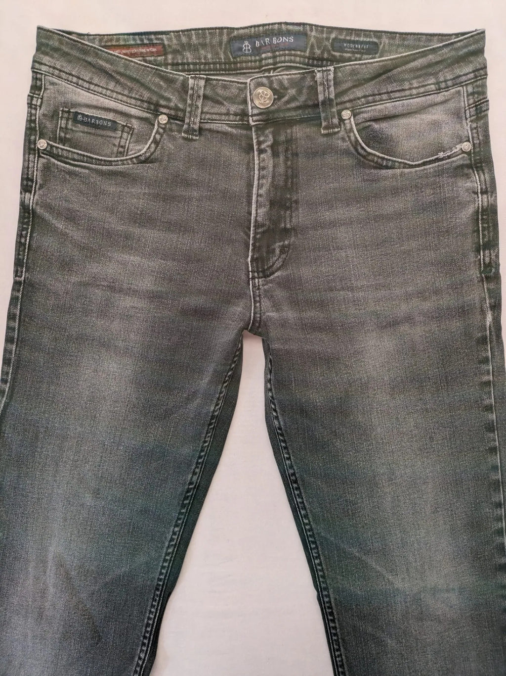 Denim grey straight jeans 5-pocket design with subtle brand details and zipper closure.
