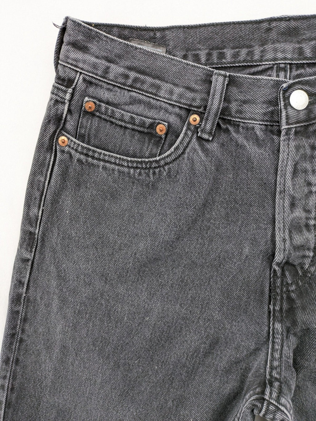 Weekday grey straight jeans with button fly and classic denim design.