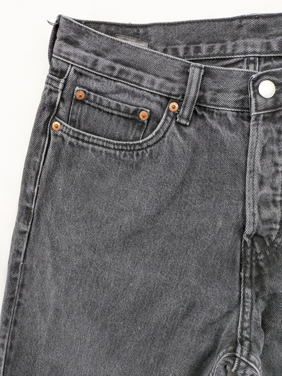 Weekday grey straight jeans with button fly and classic denim design.