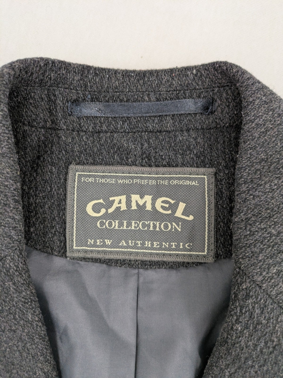 Camel Collection grey blazer three-button front with patch pockets, made from wool blend.