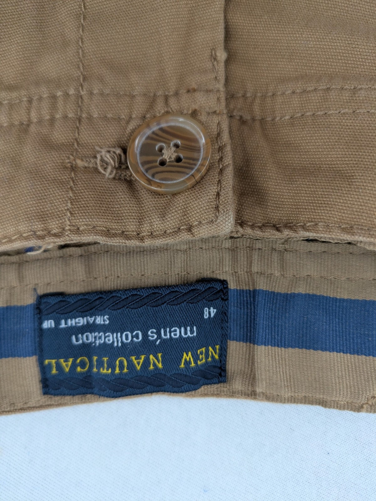 Nautical tan chino pants straight fit cotton blend with subtle anchor print lining.