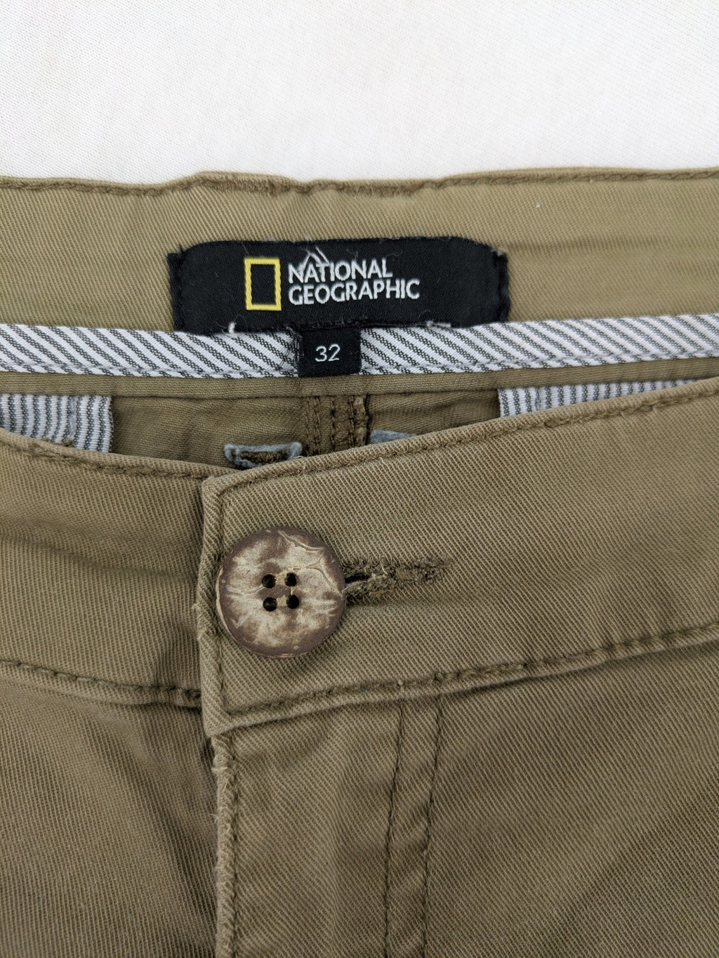 National Geographic khaki shorts flat front design with subtle logo patch