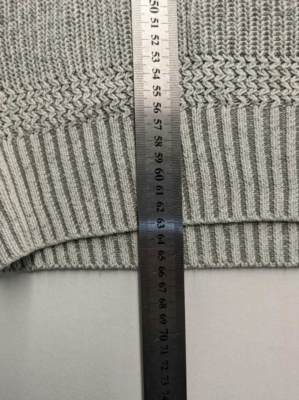 Autumn Glow grey turtle neck jumper with ribbed pattern and button detail.